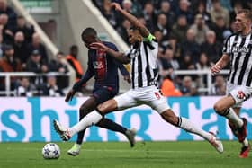 Newcastle United’s English defender #06 Jamaal Lascelles (C) blocks a shot by Paris Saint-Germain’s French forward #10 Ousmane Dembele (L) during the UEFA Champions League Group F football match between Newcastle United and Paris Saint-Germain at St James’ Park in Newcastle-upon-Tyne, north east England on October 4, 2023. (Photo by FRANCK FIFE / AFP)