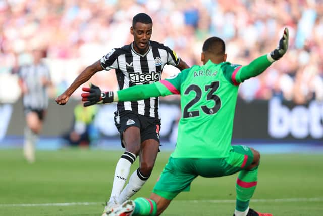 Alexander Isak of Newcastle United is challenged by Alphonse Areola of West Ham United during the Premier League match between West Ham United and Newcastle United at London Stadium on October 08, 2023 in London, England. (Photo by Tom Dulat/Getty Images)
