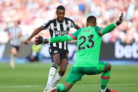 Alexander Isak of Newcastle United is challenged by Alphonse Areola of West Ham United during the Premier League match between West Ham United and Newcastle United at London Stadium on October 08, 2023 in London, England. (Photo by Tom Dulat/Getty Images)