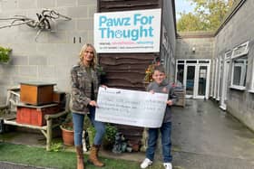 Lorraine Thornton, Pawz For Thought volunteer, with 12-year-old Henry Macdonald.
