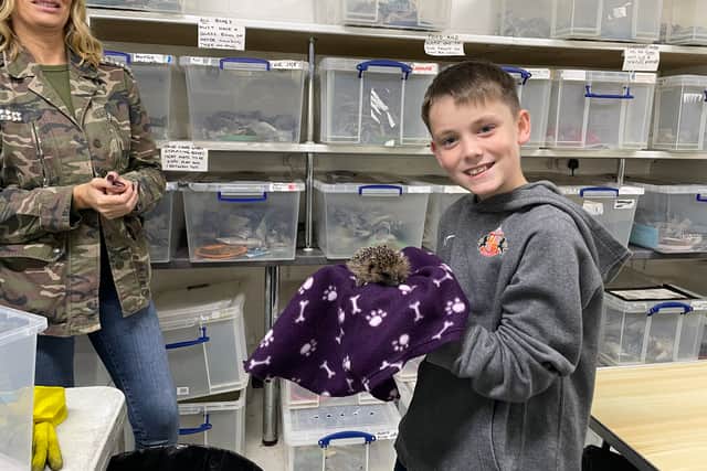 Henry and his family were given a tour of Pawz For Thought to see how the money they raised will help.