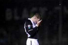Elliot Anderson of Newcastle United reacts following defeat in the Papa John’s EFL Trophy Group match between Harrogate Town and Newcastle United U21’s at The EnviroVent Stadium on October 05, 2021 in Harrogate, England. (Photo by George Wood/Getty Images)