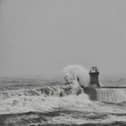 Historic South Shields lighthouse destroyed by huge waves as Storm Babet batters Britain, 20/10/23.
