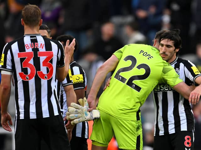 Nick Pope of Newcastle United embraces Sandro Tonali after the Premier League match between Newcastle United and Crystal Palace at St. James Park on October 21, 2023 in Newcastle upon Tyne, England. (Photo by Stu Forster/Getty Images)