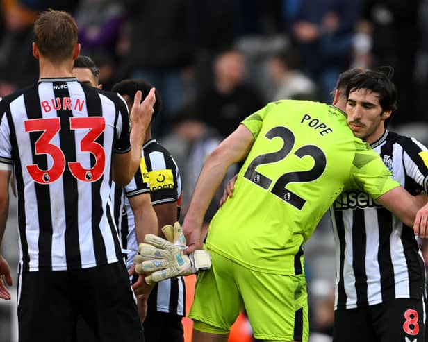 Nick Pope of Newcastle United embraces Sandro Tonali after the Premier League match between Newcastle United and Crystal Palace at St. James Park on October 21, 2023 in Newcastle upon Tyne, England. (Photo by Stu Forster/Getty Images)