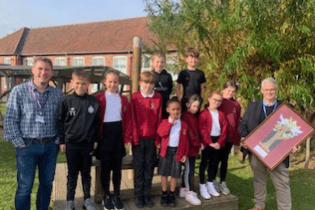 Pupils at the Mosaic Federation of Hedworthfield and Valley View Primary Schools have paid tribute to John Watson as he marks 20 years the chair of governors.
