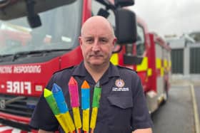 Paul Russell, Area Manager Community Safety holding fireworks much like the ones thrown at firefighters and police officers in North Marine Park in South Shields.
Credit: TWFRS