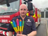  Paul Russell, Area Manager Community Safety holding fireworks much like the ones thrown at firefighters and police officers in North Marine Park in South Shields.
Credit: TWFRS