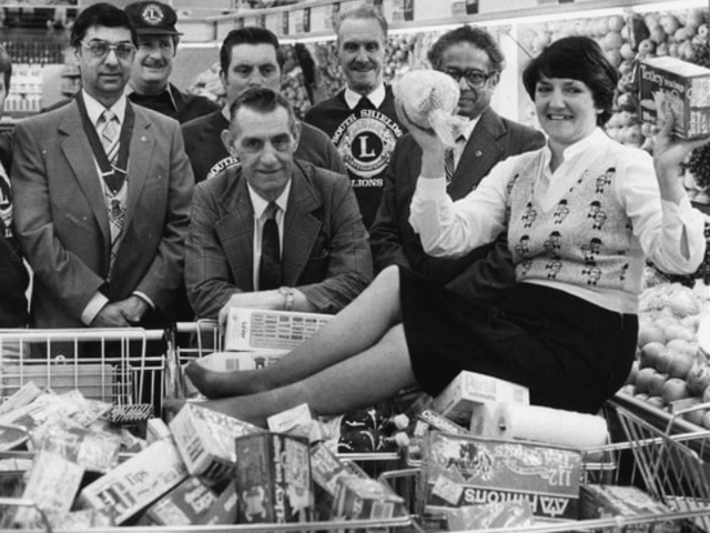 Margaret Raine did the three minute trolley dash round Hinton's store for her father George Elsy, centre, when his ticket came up in a draw held by the Lions Club. Remember it? Photo: Shields Gazette