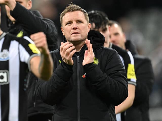 Newcastle United’s English head coach Eddie Howe applauds fans on the pitch after the English Premier League football match between Newcastle United and Arsenal at St James’ Park in Newcastle-upon-Tyne, north east England on November 4, 2023. Newcastle won the game 1-0. (Photo by Oli SCARFF / AFP)