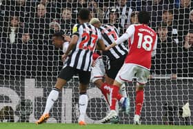 Gabriel of Arsenal is challenged by Jolinton of Newcastle United during the Premier League match between Newcastle United and Arsenal FC at St. James Park on November 04, 2023 in Newcastle upon Tyne, England. (Photo by Ian MacNicol/Getty Images)