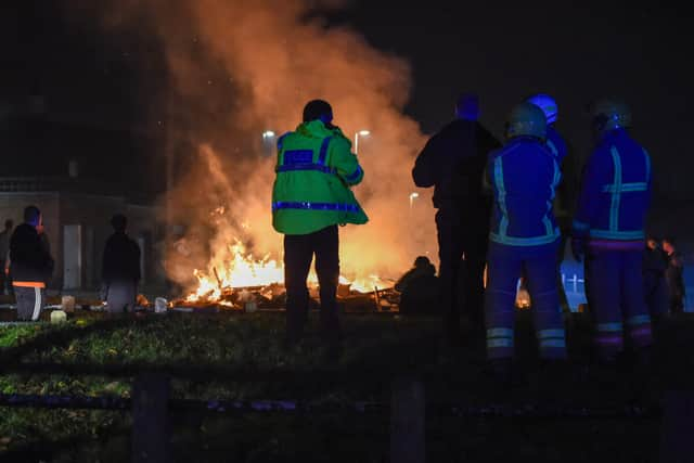 Officers attending a fire
Credit: TWFRS