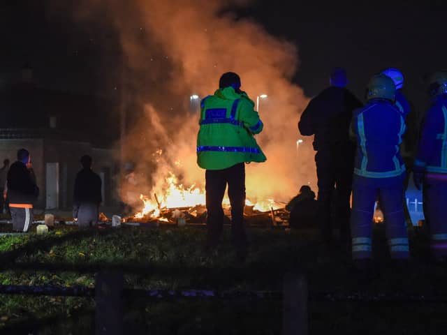 Officers attending a fire
Credit: TWFRS