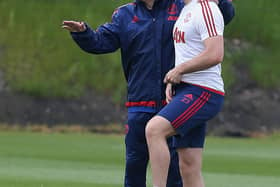 Luke Shaw and opposition coach Marcel Bout of Manchester United in action during a training session ahead of the FA Cup Final match between Crystal Palace and Manchester United at Aon Training Complex on May 19, 2016 in Manchester, England.  (Photo by Matthew Peters/Manchester United via Getty Images)