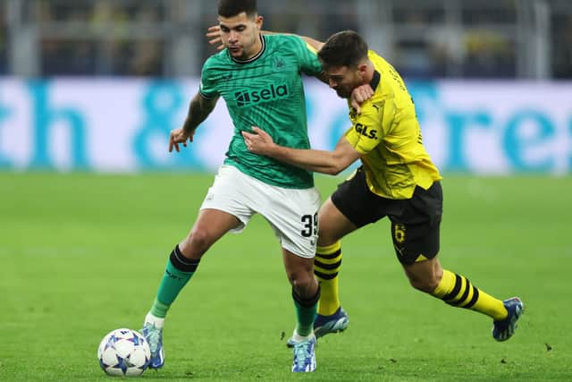 Bruno Guimaraes in action for Newcastle United against Borussia Dortmund. 