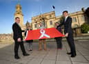 Chief Executive Jonathan Tew, Leader Cllr Tracey Dixon, Director of Public Health, Tom Hall, Cllr Ruth Berkley and Cllr Adam Ellison are pictured with the White Ribbon flag.