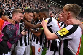 Newcastle United defender Fabian Schar celebrates his goal against PSG. 