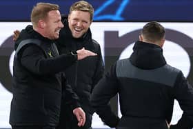 Newcastle's English coach Eddie Howe (C) jokes with members of the coaching staff during a training session at the Parc des Princes Stadium in Paris on November 27, 2023, on the eve of their UEFA Champions League football match against Paris Saint-Germain. (Photo by FRANCK FIFE / AFP) (Photo by FRANCK FIFE/AFP via Getty Images)