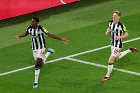 Newcastle United's Swedish striker #14 Alexander Isak celebrates after opening the scoring during the UEFA Champions League 1st round, day 5, Group F football match between Paris Saint-Germain (PSG) and Newcastle United at the Parc des Princes stadium in Paris, on November 28, 2023. (Photo by Alain JOCARD / AFP) (Photo by ALAIN JOCARD/AFP via Getty Images)