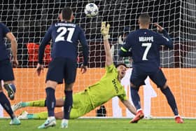 Paris Saint-Germain's French forward #07 Kylian Mbappe (R) scores a penalty kick in front of Newcastle United's English goalkeeper #22 Nick Pope during the UEFA Champions League 1st round, day 5, Group F football match between Paris Saint-Germain (PSG) and Newcastle United on November 28, 2023 at the Parc des Princes stadium in Paris. (Photo by Bertrand GUAY / AFP) (Photo by BERTRAND GUAY/AFP via Getty Images)