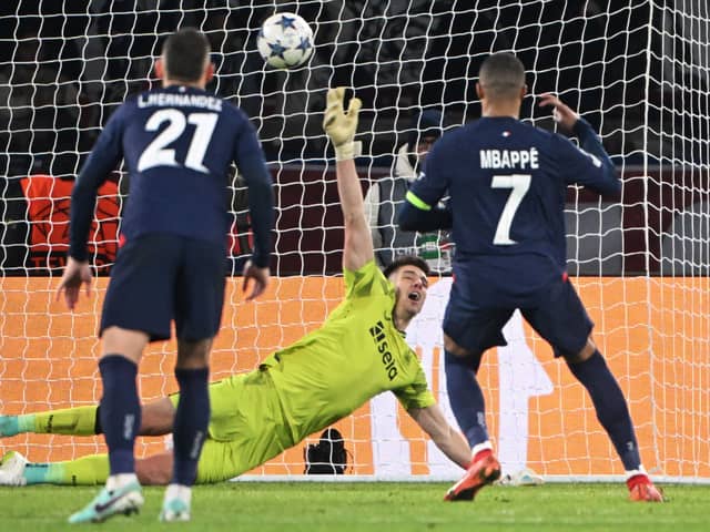 Paris Saint-Germain's French forward #07 Kylian Mbappe (R) scores a penalty kick in front of Newcastle United's English goalkeeper #22 Nick Pope during the UEFA Champions League 1st round, day 5, Group F football match between Paris Saint-Germain (PSG) and Newcastle United on November 28, 2023 at the Parc des Princes stadium in Paris. (Photo by Bertrand GUAY / AFP) (Photo by BERTRAND GUAY/AFP via Getty Images)