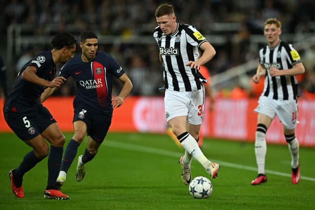Elliot Anderson in action for Newcastle United against Paris Saint-Germain. 