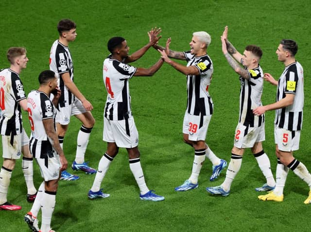 Bruno Guimaraes and Alexander Isak celebrate for Newcastle United against PSG. 