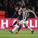 Newcastle United in action against Paris Saint-Germain. 