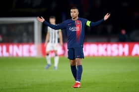 Kylian Mbappe of Paris Saint-Germain reacts during the UEFA Champions League match between Paris Saint-Germain and Newcastle United FC at Parc des Princes on November 28, 2023 in Paris, France. (Photo by Justin Setterfield/Getty Images)