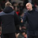 Eddie Howe and Erik ten Hag shake hands after Newcastle United's 3-0 win over Manchester United. 