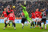 Jamaal Lascelles of Newcastle United attempts to head the ball during the Premier League match between Newcastle United and Manchester United at St. James Park on December 02, 2023 in Newcastle upon Tyne, England. (Photo by Stu Forster/Getty Images)