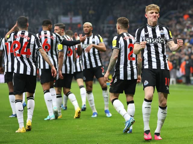 Anthony Gordon of Newcastle United celebrates after scoring the team's first goal during the Premier League match between Newcastle United and Manchester United at St. James Park on December 02, 2023 in Newcastle upon Tyne, England. (Photo by Clive Brunskill/Getty Images)