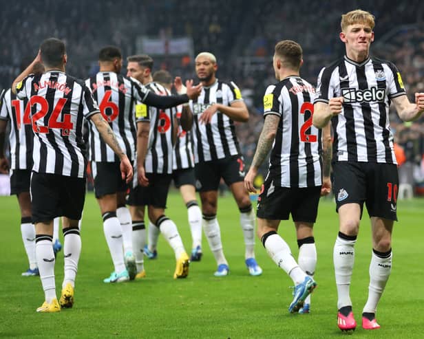 Anthony Gordon of Newcastle United celebrates after scoring the team's first goal during the Premier League match between Newcastle United and Manchester United at St. James Park on December 02, 2023 in Newcastle upon Tyne, England. (Photo by Clive Brunskill/Getty Images)
