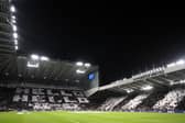 A general view inside the stadium as fans of Newcastle United display banners prior to the UEFA Champions League match between Newcastle United FC and Paris Saint-Germain at St. James' Park. (Photo by Stu Forster/Getty Images)