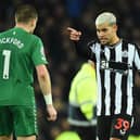 Newcastle United midfielder Bruno Guimaraes remonstrates with Everton goalkeeper Jordan Pickford after his side's 3-0 loss to Everton. (Photo by PETER POWELL/AFP via Getty Images)