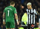 Newcastle United midfielder Bruno Guimaraes remonstrates with Everton goalkeeper Jordan Pickford after his side's 3-0 loss to Everton. (Photo by PETER POWELL/AFP via Getty Images)