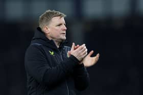 Newcastle United head coach Eddie Howe applauds his side's travelling supporters. 