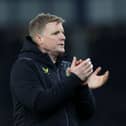 Newcastle United head coach Eddie Howe applauds his side's travelling supporters. 
