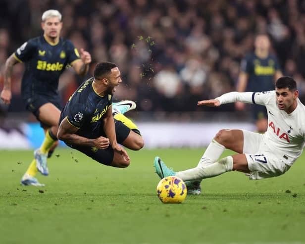 Callum Wilson of Newcastle United clashes with Cristian Romero of Tottenham Hotspur during the Premier League match between Tottenham Hotspur and Newcastle United at Tottenham Hotspur Stadium on December 10, 2023 in London, England. (Photo by Julian Finney/Getty Images)