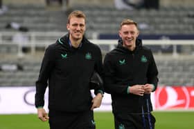 Dan Burn and Sean Longstaff of Newcastle United arrive at the stadium prior to the UEFA Champions League match between Newcastle United FC and AC Milan at St. James Park on December 13, 2023 in Newcastle upon Tyne, England. (Photo by Michael Steele/Getty Images)