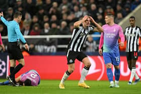 Fabian Schar of Newcastle United reacts during the UEFA Champions League match between Newcastle United FC and AC Milan at St. James Park on December 13, 2023 in Newcastle upon Tyne, England. (Photo by Stu Forster/Getty Images)