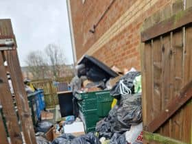 Piling rubbish at the block of flats