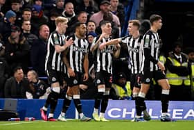 Callum Wilson of Newcastle United celebrates with team mates after scoring their sides first goal during the Carabao Cup Quarter Final match between Chelsea and Newcastle United at Stamford Bridge on December 19, 2023 in London, England. (Photo by Mike Hewitt/Getty Images)