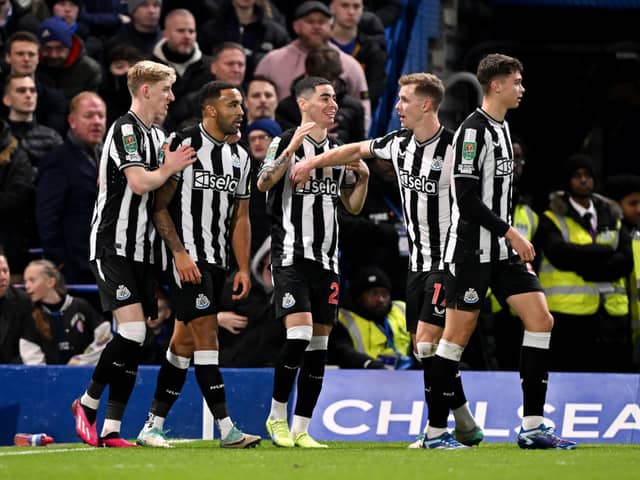 Callum Wilson of Newcastle United celebrates with team mates after scoring their sides first goal during the Carabao Cup Quarter Final match between Chelsea and Newcastle United at Stamford Bridge on December 19, 2023 in London, England. (Photo by Mike Hewitt/Getty Images)