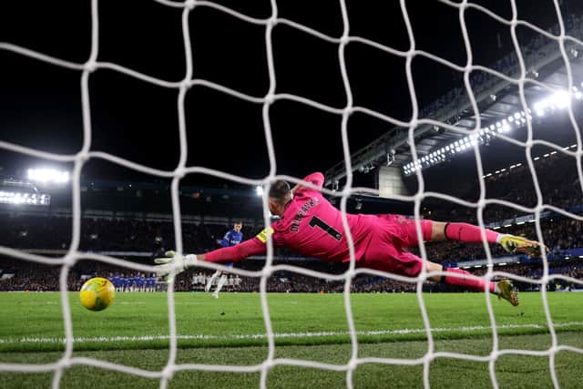 Martin Dubravka of Newcastle United fails to save a penalty taken by Cole Palmer of Chelsea during a penalty shoot out in the Carabao Cup Quarter Final match between Chelsea and Newcastle United at Stamford Bridge on December 19, 2023 in London, England. (Photo by Julian Finney/Getty Images)