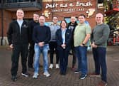 Directors from Barratt Developments North East volunteering for its Charity Of The Year Daft as a Brush