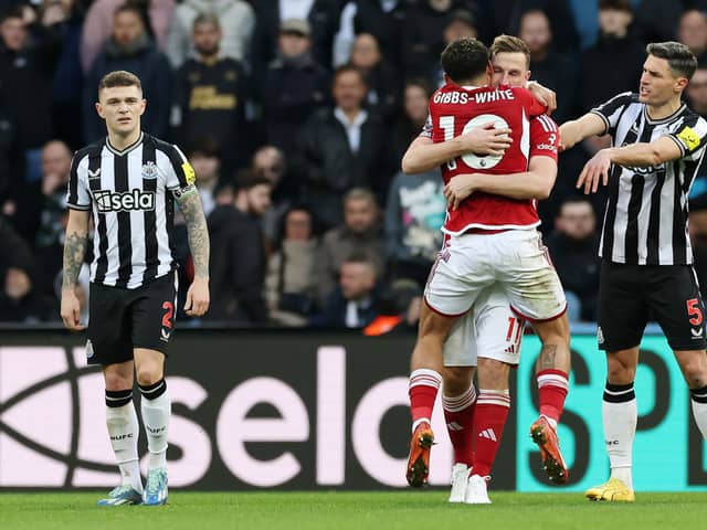 Chris Wood of Nottingham Forest celebrates with team mate Morgan Gibbs-White after scoring their sides third goal during the Premier League match between Newcastle United and Nottingham Forest at St. James Park on December 26, 2023 in Newcastle upon Tyne, England. 