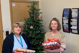 Staff Nurse Wendy Brown and Healthcare Assistant Jan Defty with nightwear gifted to South Tyneside District Hospital.