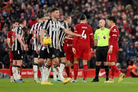 Anthony Taylor awards Liverpool a penalty against Newcastle United. 