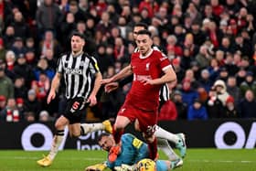 Diogo Jota of Liverpool brought down for a penalty by Martin Dubravka of Newcastle United during the Premier League match between Liverpool FC and Newcastle United at Anfield on January 01, 2024 in Liverpool, England. (Photo by Andrew Powell/Liverpool FC via Getty Images)
